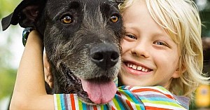 Dog Supplements Happy Young Boy Hugging Pet Dog E1683299723357
